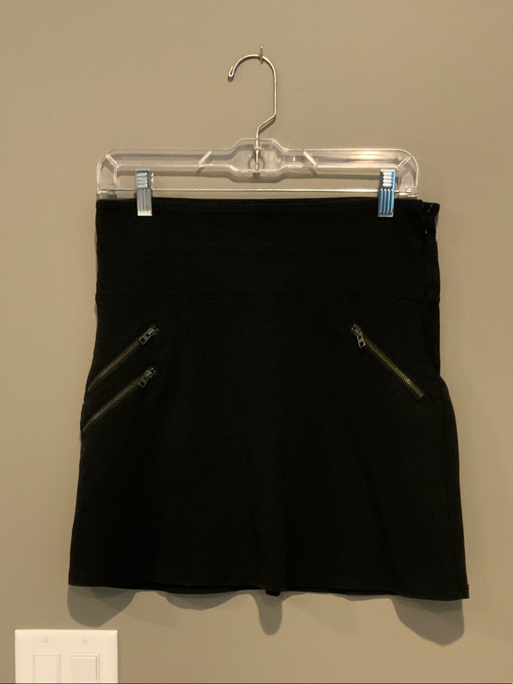 Athleta Black High-Rise Mini Skirt with Angled Zip Pockets
